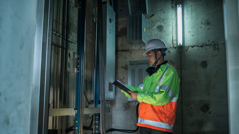 lift technician in lift shaft